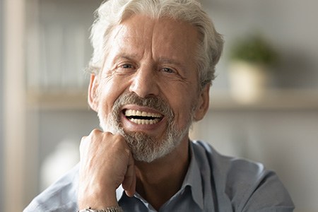 Man smiling with dentures