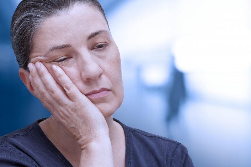 Woman not sure if she has a toothache or sinus issues